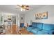 Open-concept living area showcases hardwood floors and connects to the kitchen at 3070 Cameron Dr, Henderson, NC 27536