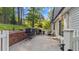 Patio showing a brick wall, seating area, and views of the home's backyard at 3070 Cameron Dr, Henderson, NC 27536