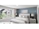 Serene bedroom with large windows, neutral decor, and white bedding for a relaxing retreat at 338 Cottage Hill Way, Knightdale, NC 27604