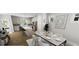 Bright kitchen with island and stainless steel appliances, open to the dining area for easy entertaining at 338 Cottage Hill Way, Knightdale, NC 27604