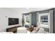 Cozy living room with contemporary furniture, a large screen television, and two large windows with natural light at 338 Cottage Hill Way, Knightdale, NC 27604