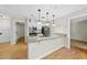 Bright kitchen with stainless steel appliances and a breakfast bar at 3427 Mill Run, Raleigh, NC 27612