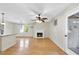 Open floor plan featuring a fireplace and kitchen with granite counters at 3427 Mill Run, Raleigh, NC 27612