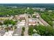 Aerial view of the town showcasing its central business district and surrounding green spaces at 415 1St St, Apex, NC 27502