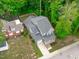 Aerial view of the house, green lawn, and surrounding neighborhood, offering a great sense of location at 415 1St St, Apex, NC 27502