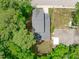 Aerial view of the property and neighborhood with its backyard area at 415 1St St, Apex, NC 27502