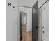 Bathroom interior showing a walk-in shower with white tiling, contrasting trim and a shower curtain at 415 1St St, Apex, NC 27502