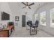 Bright office features plush carpet, lots of light, and a computer desk at 415 1St St, Apex, NC 27502