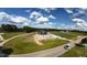 Aerial view of a new construction home with an expansive lot surrounded by trees and a quiet country road at 5008 Hopkins Chapel Rd, Zebulon, NC 27597