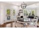 Cozy breakfast nook with a view of the backyard and access to the outdoor space at 604 Nottely Pl, Cary, NC 27519