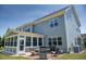 Backyard patio with outdoor seating and grill at 604 Nottely Pl, Cary, NC 27519