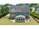 View of the screened-in porch and patio in the backyard at 604 Nottely Pl, Cary, NC 27519