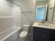Modern bathroom featuring a shower and tub, a toilet, and a vanity with sink at 64 Rainfall Dr, Pittsboro, NC 27312