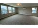 Large bonus room with ample natural light from three large windows at 64 Rainfall Dr, Pittsboro, NC 27312