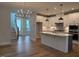 Beautiful kitchen features an island, stainless steel appliances, and ample cabinet space at 64 Rainfall Dr, Pittsboro, NC 27312