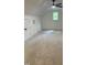 Spacious bedroom with plush carpeting, a ceiling fan, and a sun-filled window at 690 Oaks Lane Rd, Timberlake, NC 27583