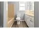 The bathroom includes a clean, functional layout with ample storage space and a well-maintained shower/tub combination at 7924 Knightdale Blvd, Knightdale, NC 27545
