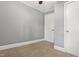 A cozy bedroom with neutral tones and closet space creates a comfortable and private retreat at 7924 Knightdale Blvd, Knightdale, NC 27545