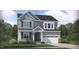 Charming two-story home featuring a two-car garage, stone accents, and a well-manicured front lawn at 800 Kinglet House Rd, Knightdale, NC 27545