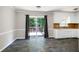 Bright kitchen featuring a sliding glass door to deck at 100 Honeysuckle Ln, Cary, NC 27513