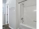 Bright white stand-up shower stall with integrated shelving at 100 Honeysuckle Ln, Cary, NC 27513