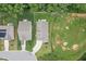 An aerial view showing the layout of the house with green lawn at 100 Pronghorn Deer Ct, Garner, NC 27529