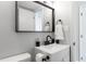 Updated bathroom featuring a modern vanity, matte black fixtures, and neutral paint at 1002 Willow Dr # Apt 107, Chapel Hill, NC 27514
