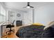 This bedroom features wood floors, closet, and a ceiling fan at 1002 Willow Dr # Apt 107, Chapel Hill, NC 27514