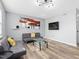 Inviting living room with modern decor, wood flooring, and stylish furnishings at 1002 Willow Dr # Apt 107, Chapel Hill, NC 27514
