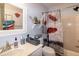 Bathroom with a vanity, toilet, and shower with curtain, all efficiently arranged at 1008 Catsby Cir, Raleigh, NC 27603