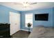 Bright bedroom featuring a ceiling fan, natural light and an armoire at 1008 Catsby Cir, Raleigh, NC 27603