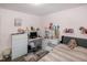 Cozy bedroom with laminate floors, white dresser and desk, and comfortable bed at 1008 Catsby Cir, Raleigh, NC 27603