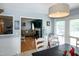 The dining room is open to the living room and features a view into the back yard at 1008 Catsby Cir, Raleigh, NC 27603