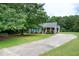Charming home with a large front yard, inviting curb appeal and a long driveway at 1008 Catsby Cir, Raleigh, NC 27603