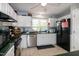 The well-lit kitchen is equipped with modern appliances, plenty of storage, and an efficient layout at 1008 Catsby Cir, Raleigh, NC 27603