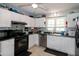 The kitchen features ample cabinet space, modern appliances, and neutral countertops, perfect for culinary enthusiasts at 1008 Catsby Cir, Raleigh, NC 27603