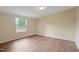Serene bedroom with large window and neutral tones at 101 Hunter Fld, Sanford, NC 27332