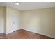 Neutral bedroom with modern flooring, a built-in closet and neutral color palette at 101 Hunter Fld, Sanford, NC 27332