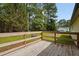 Spacious wooden deck overlooking a lush green yard at 101 Hunter Fld, Sanford, NC 27332