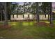 Charming home with a manicured lawn and surrounded by mature trees at 101 Hunter Fld, Sanford, NC 27332