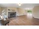 Bright living room with fireplace and sliding door access to the backyard at 101 Hunter Fld, Sanford, NC 27332