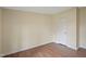 Cozy room with wood-look flooring and white trim, ready for personal touches at 101 Hunter Fld, Sanford, NC 27332
