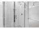 Bathroom with a glass-enclosed shower and modern fixtures at 1012 Lily Claire Ln, Fuquay Varina, NC 27526