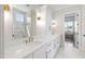 Bathroom featuring double sinks, modern fixtures, and luxurious finishes at 1012 Lily Claire Ln, Fuquay Varina, NC 27526