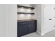 Bonus room featuring a wet bar area, shelving, and modern fixtures at 1012 Lily Claire Ln, Fuquay Varina, NC 27526