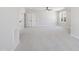 Bonus room with carpet, a ceiling fan, and access to other rooms at 1012 Lily Claire Ln, Fuquay Varina, NC 27526