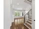 View of the home's foyer leading to the living room and staircase at 1012 Lily Claire Ln, Fuquay Varina, NC 27526