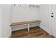 Functional mudroom with built-in bench seating and ample storage for organization at 1012 Lily Claire Ln, Fuquay Varina, NC 27526