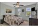 A cozy bedroom with natural light streaming through the windows at 102 Lake Meadow Dr, Apex, NC 27502