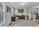 Bright office with neutral walls, carpet flooring, and a functional black desk with lots of space at 102 Lake Meadow Dr, Apex, NC 27502